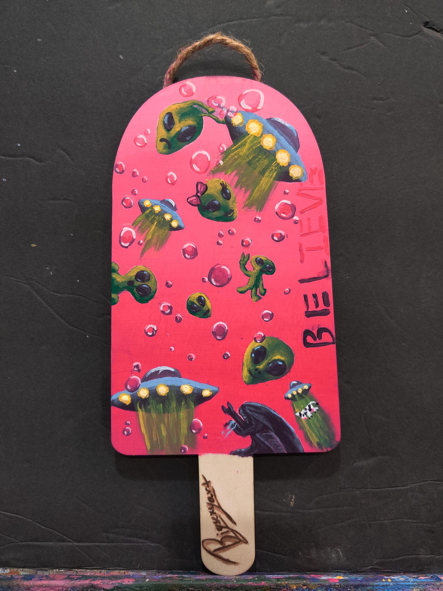 Pink alien abduction hand-painted popsicle with UFOs and bubbles